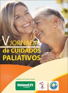 Imagem de duas mulheres, uma mais jovem e outra mais idosa, sorrindo com o texto "V Jornada de Cuidados Paliativos" em destaque